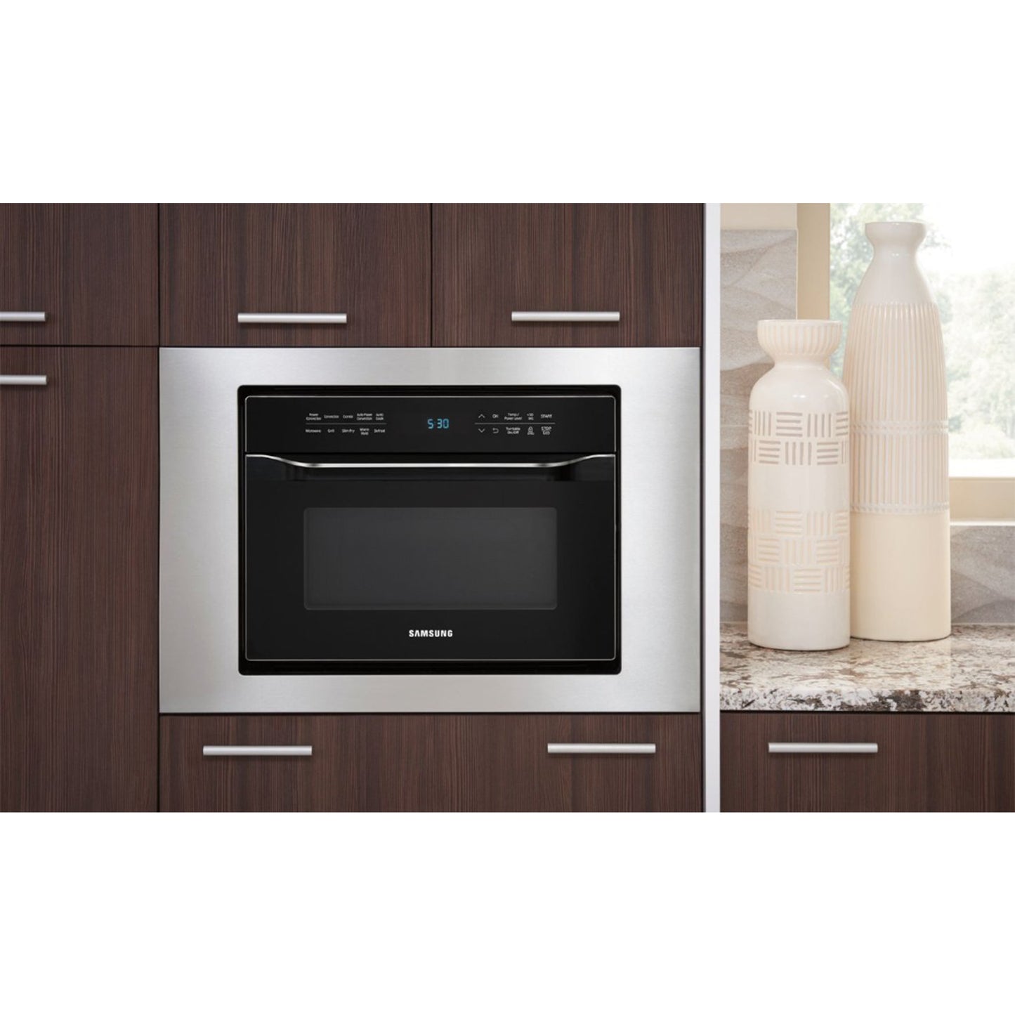 1.2 cu. ft. PowerGrill Duo™ Countertop Microwave with Power Convection and Built-In Application in Black.